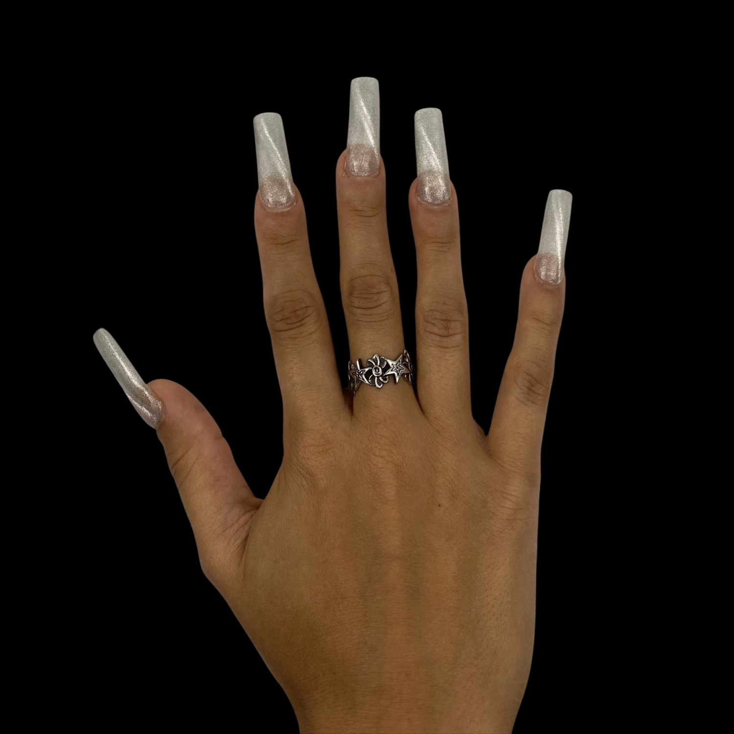 Flower ring on female hand