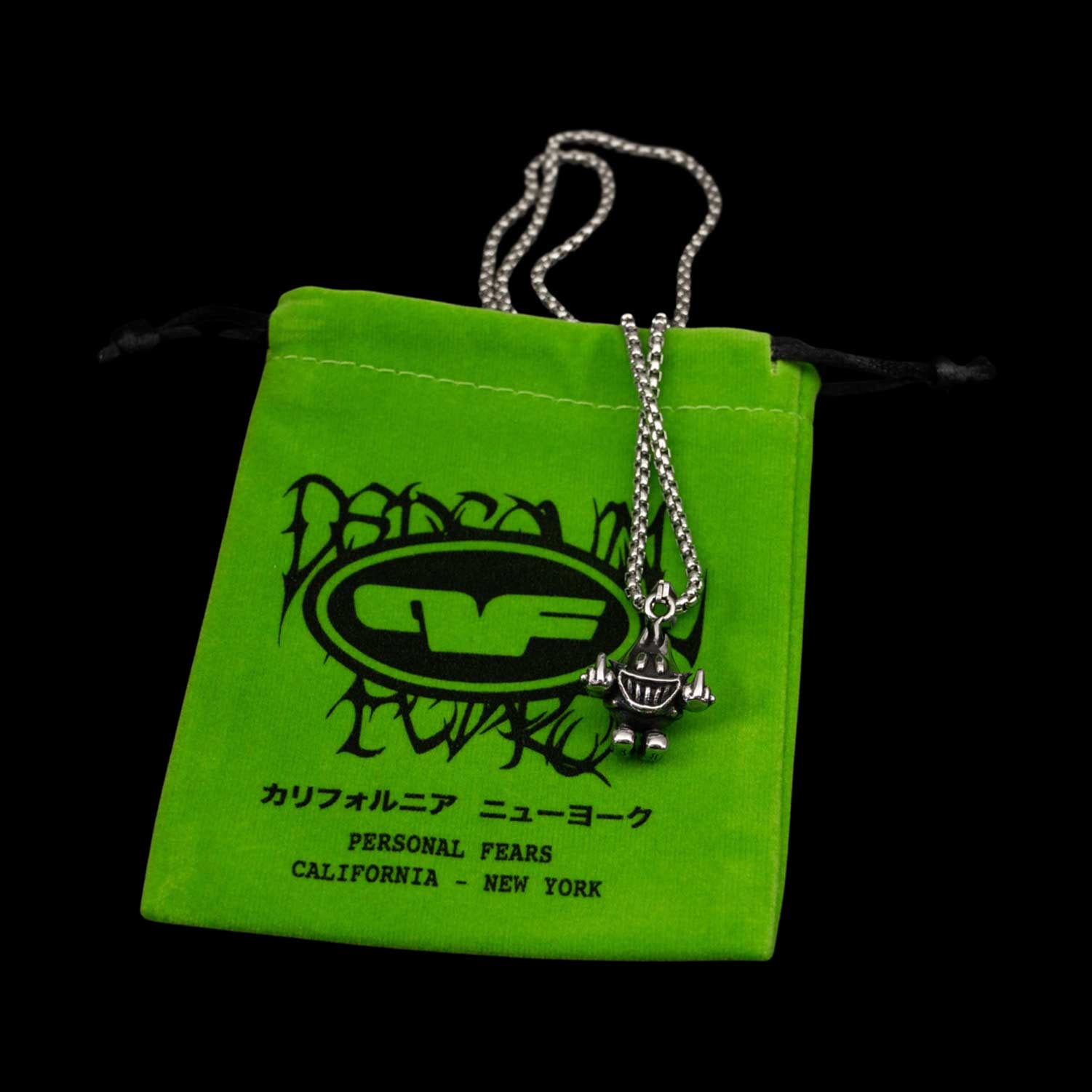 Lame Boy Pendant by Personal Fears with Green carrying bag