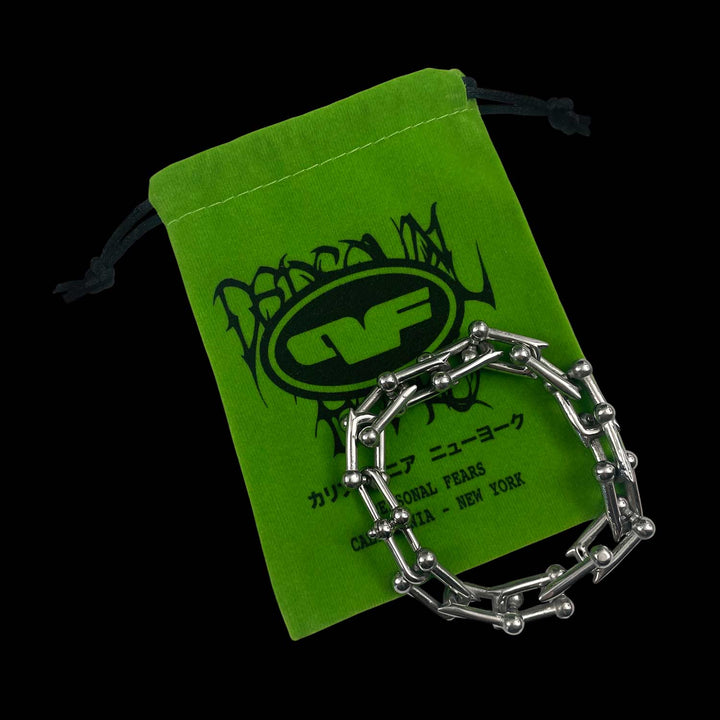 Personal Fears Lilith Bracelet with green carrying bag